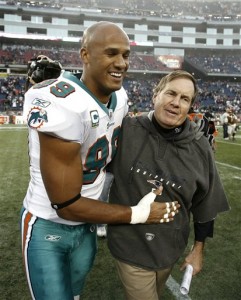 Jason Taylor hugs Bill Belichick after the Patriots defeated the Dolphins 27-17 on Nov. 8, 2009. (AP Photo/Winslow Townson)