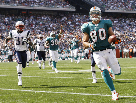 Ah, memories.  Fasano runs into the end zone in a 38-13 Dolphins victory in Foxborough on Sept. 21, 2008.
